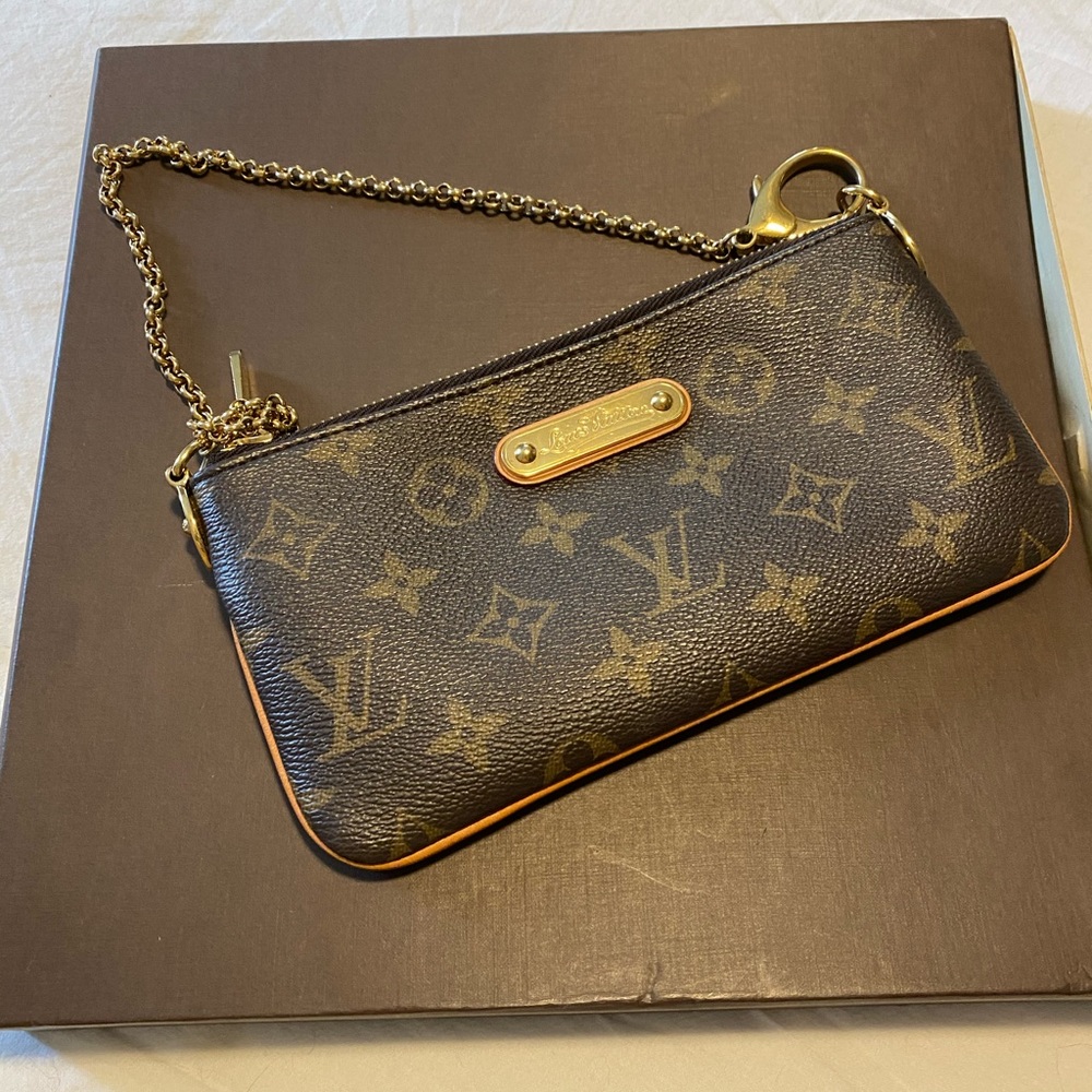 Authentic Louis Vuitton Milla Pouchette